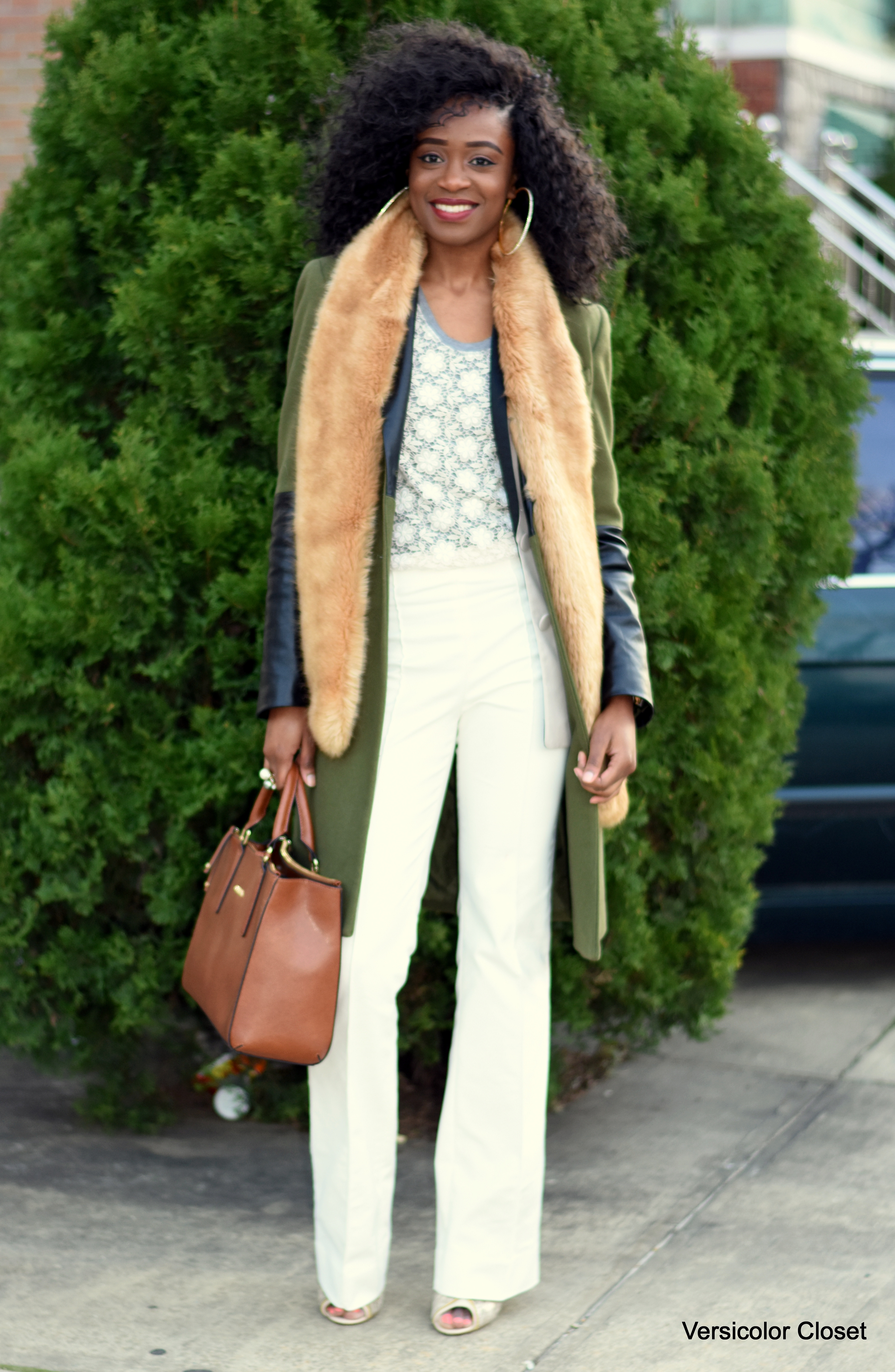 “White trousers & faux fur stole”